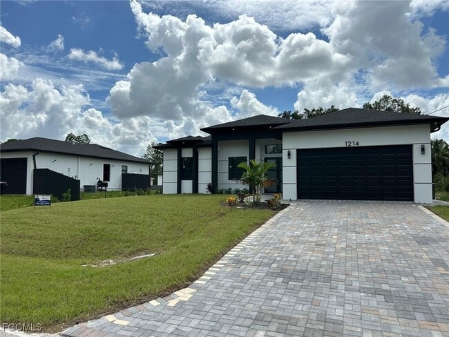 1214 Cherry St E in Lehigh Acres, FL - Building Photo - Building Photo