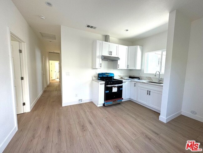 property at 1220 W 25th St