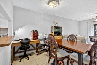 7142 Golf Colony Ct-Unit -102 in Greenacres, FL - Building Photo - Building Photo