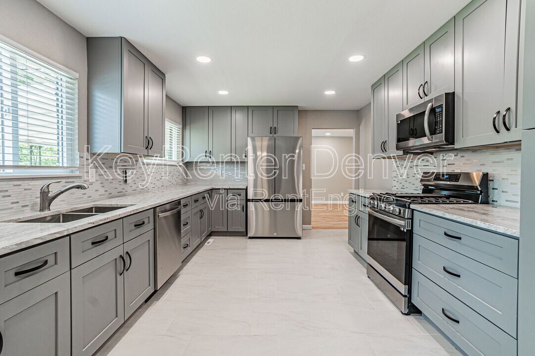 3730 W Saratoga Ave in Littleton, CO - Building Photo