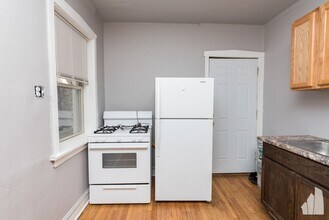 4051 W Melrose St, Unit Unit 27-1N in Chicago, IL - Building Photo - Building Photo