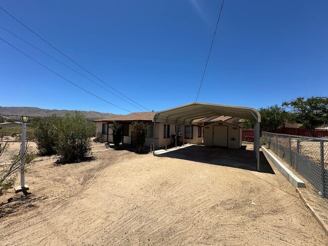 property at 6182 El Reposo St