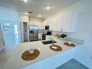 11929 SW 247th Ter, Unit H4 in Homestead, FL - Building Photo - Building Photo
