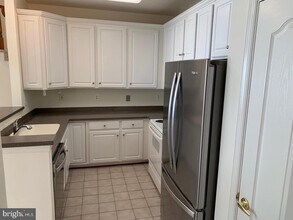 12161 Abington Hall Pl-Unit -304 in Reston, VA - Building Photo - Building Photo