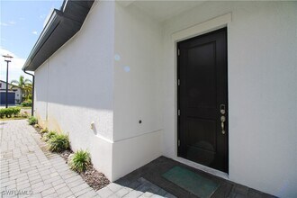 14803 Loggerhead Dr in Naples, FL - Building Photo - Building Photo