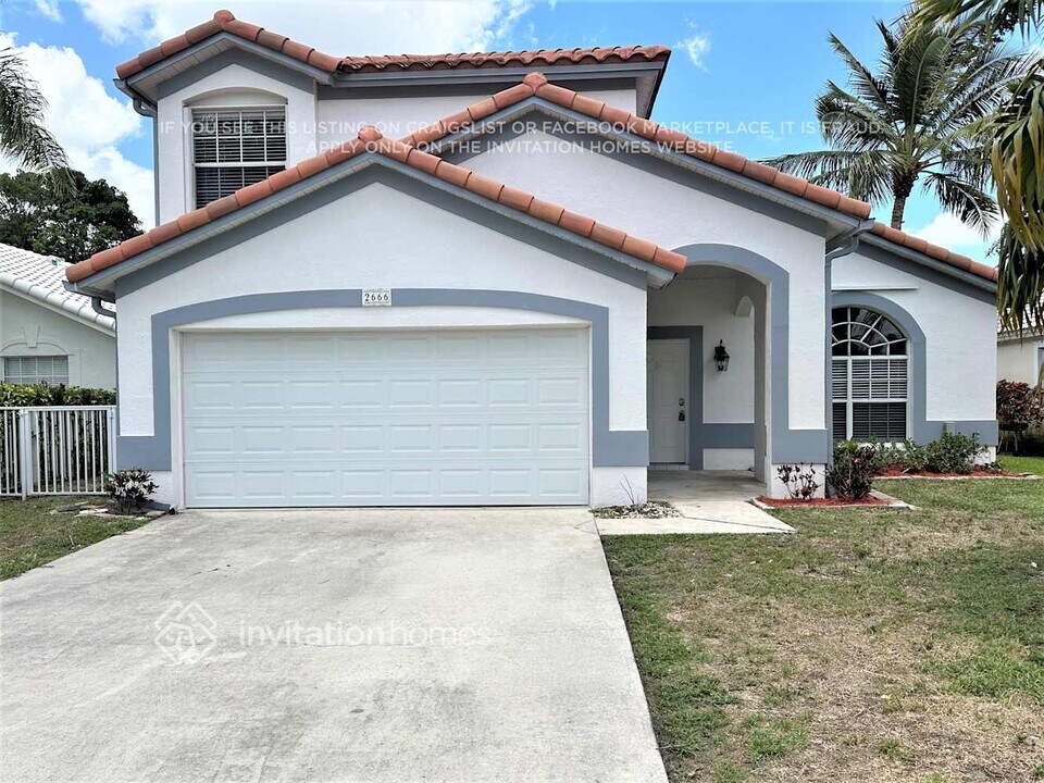 2666 Fairway Cove Ct in Wellington, FL - Building Photo