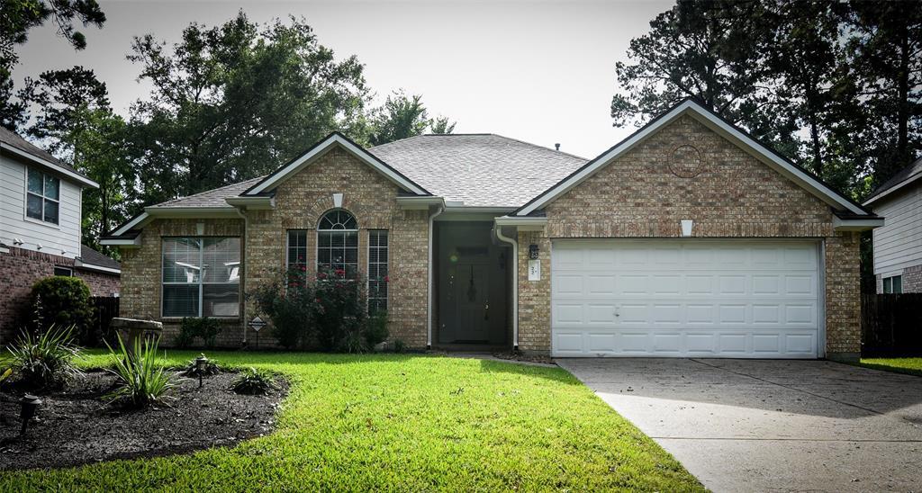 22 E Hobbit Glen Dr in Conroe, TX - Building Photo