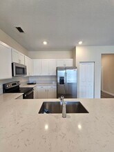 6951 Harbours Edge Ave in Greenacres, FL - Building Photo - Building Photo