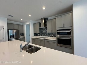 414 Loymer Cir in Merritt Island, FL - Foto de edificio - Building Photo