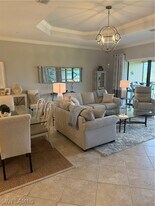 8765 Bellano Ct in Naples, FL - Building Photo