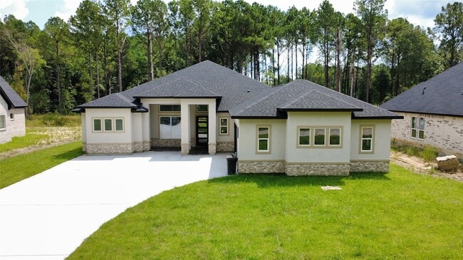 3037 Rd 66124 in Dayton, TX - Building Photo - Building Photo