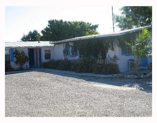 Triplex in Saint James City, FL - Building Photo