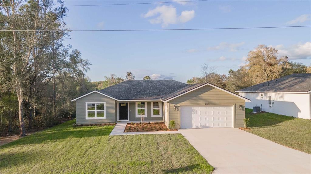 8765 SE 160th Pl in Summerfield, FL - Building Photo
