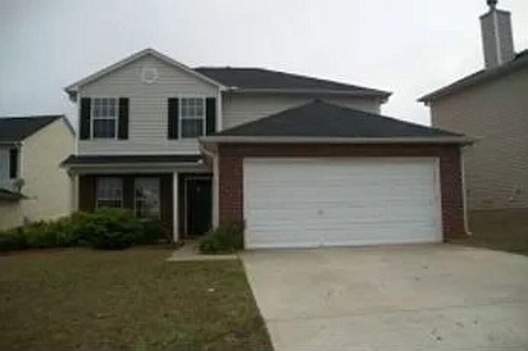 1106 St Phillips Ct in Locust Grove, GA - Building Photo