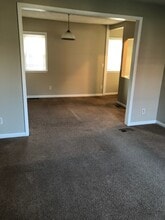 91 E Mohawk St, Unit 1 in Oswego, NY - Foto de edificio - Building Photo