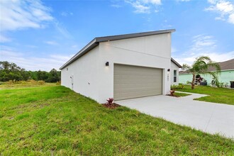 1057 Sabine Pl in Poinciana, FL - Building Photo - Building Photo
