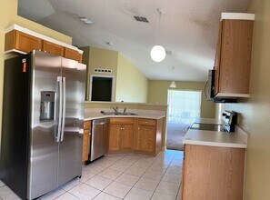 14121 Econ Woods Ln in Orlando, FL - Building Photo - Building Photo