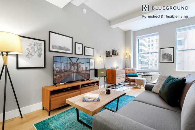 67 Wall St, Unit FL12-ID45 in New York, NY - Building Photo - Building Photo
