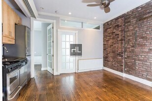 E 1ST ST. in New York, NY - Building Photo