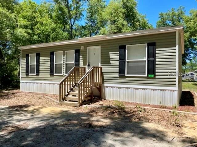 854 SE 38th St in Melrose, FL - Building Photo