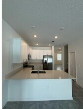 7717 Stone Crk Trl in Kissimmee, FL - Building Photo - Building Photo
