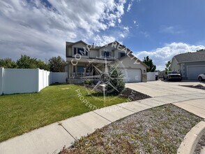 5921 Genoa Ln in Stansbury Park, UT - Building Photo - Building Photo