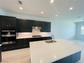 9080 Wisteria Wy in Naples, FL - Building Photo - Building Photo