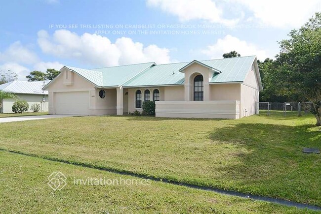 1649 SE Lorraine St in Port St. Lucie, FL - Foto de edificio - Building Photo