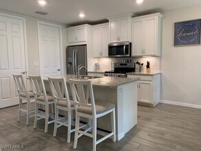 14631 Edgewater Cir in Naples, FL - Building Photo - Building Photo