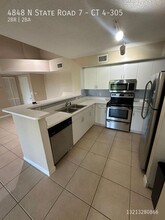 4848 N State Rd 7-Unit -CT 4-305 in Coconut Creek, FL - Building Photo - Building Photo