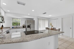 1057 Tropical Ave NW in Port Charlotte, FL - Building Photo