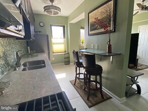 1001 St Paul St, Unit 3F in Baltimore, MD - Building Photo - Building Photo