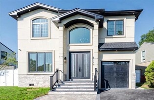 114 Emily Ave in Elmont, NY - Building Photo