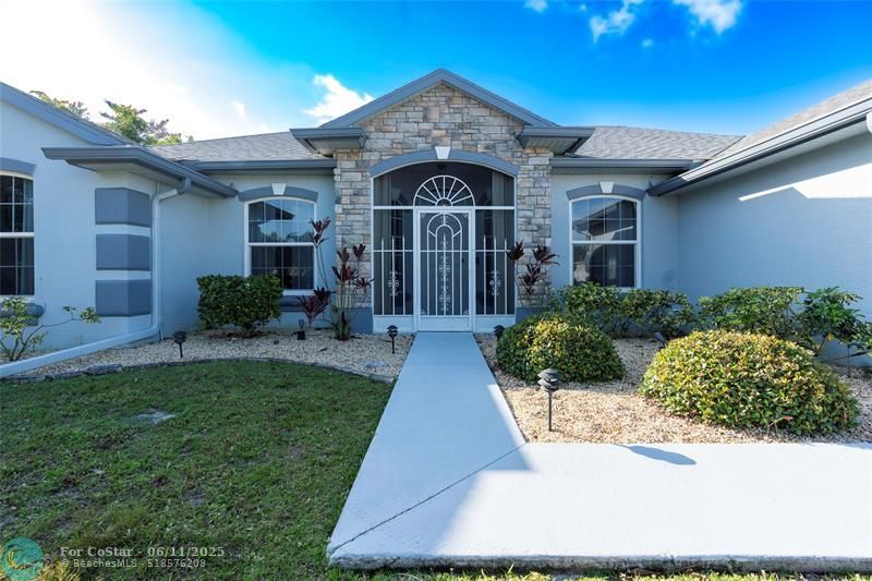 1580 SW Santander Ave in Port St. Lucie, FL - Building Photo