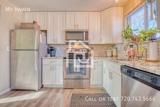 15169 E Columbia Dr in Aurora, CO - Building Photo - Building Photo