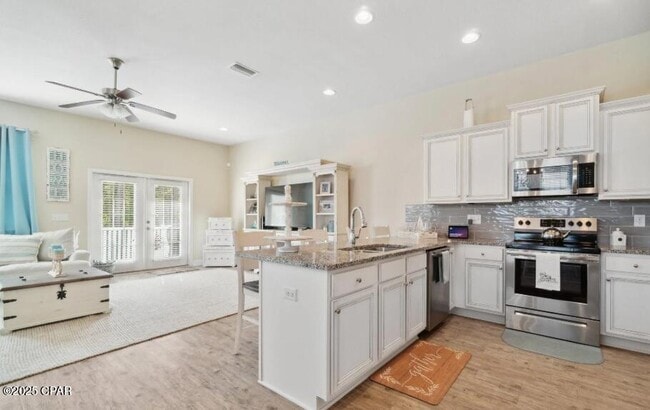 100 Barefoot Falls in Panama City Beach, FL - Building Photo - Building Photo