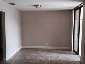 2446 NW 49th Terrace in Coconut Creek, FL - Building Photo - Building Photo