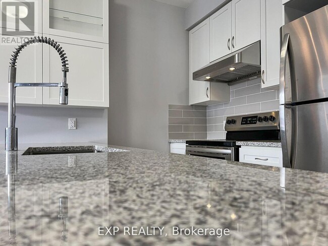 2-312 Adam Sellers St in Markham, ON - Building Photo - Building Photo