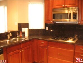 1135 Rexford Dr in Los Angeles, CA - Building Photo - Building Photo