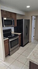105 Dartmouth Dr NW in Port Charlotte, FL - Building Photo - Building Photo