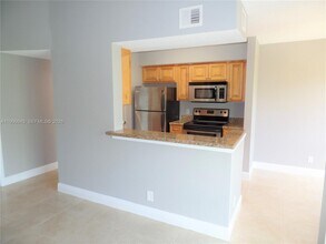 5740 Rock Island Rd in Tamarac, FL - Building Photo - Building Photo