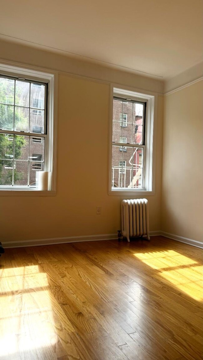 property at 117 W 13th St