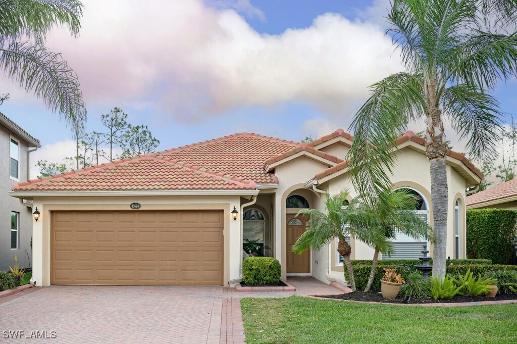 13624 Troia Dr in Estero, FL - Building Photo
