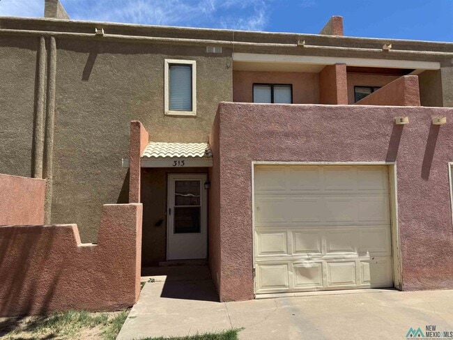 property at 313 S 3rd St