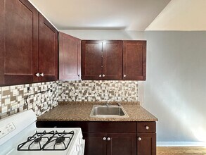 5679 N Ridge Ave, Unit J01P in Chicago, IL - Foto de edificio - Building Photo