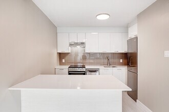 Villa Saint-Jean in Dollard-des-Ormeaux, QC - Building Photo - Building Photo
