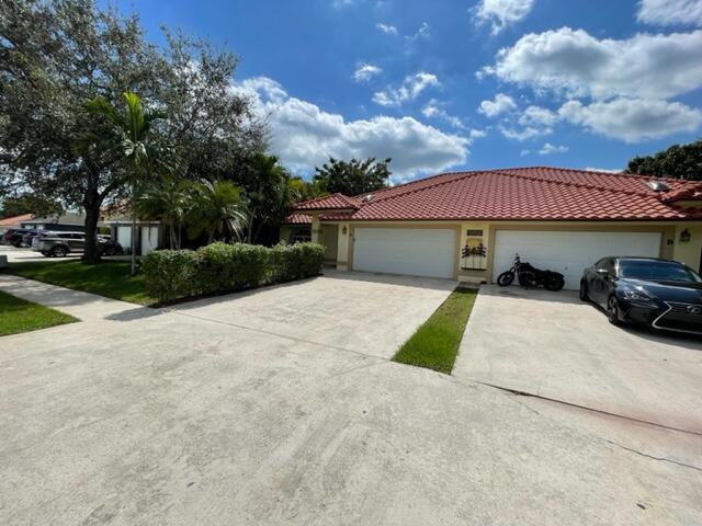 13752 Yarmouth Dr in Wellington, FL - Building Photo - Building Photo