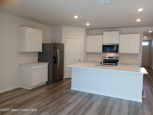 1560 Gardenton St NW in Palm Bay, FL - Building Photo - Building Photo