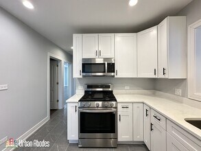 5510 N Luna Ave, Unit J01W in Chicago, IL - Building Photo - Building Photo
