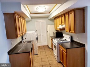 10250 Prince Pl-Unit -24-107 in Largo, MD - Building Photo - Building Photo